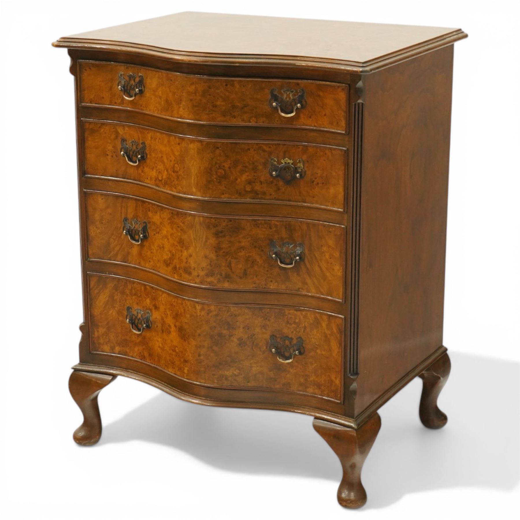 Queen Anne design figured walnut serpentine-front chest, fitted with four graduating cock-beaded drawers flanked by canted fluted uprights, on cabriole feet