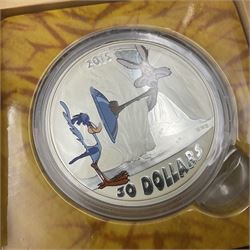 Three Royal Canadian Mint 2015 'Looney Tunes Classic Scenes' fine silver coins, comprising 'Fast and Furry-ous' thirty dollars, 'Birds Anonymous' thirty dollars and 'Merrie Melodies' twenty dollars, all cased with certificates