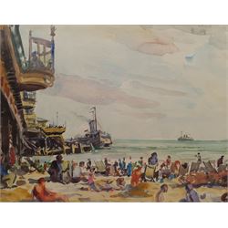 George Herbert Buckingham Holland (British 1901-1987): Figures on Bournemouth Beach with a Steamer docked at the Pier, watercolour signed and dated ‘77, 28cm x 37cm