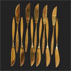 Extensive suite of WMF 800 silver gilt cutlery, for twelve covers, comprising twelve table knives and forks, fish knives and forks, dessert forks, table spoons, dessert spoons, teaspoons, eleven dessert forks and six serving spoons, with crescent moon and crown WMF hallmarks