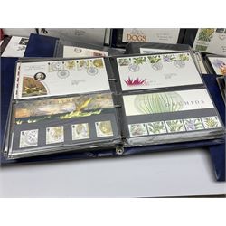 Mostly Great British first day covers, some with special postmarks, from the 1960s to the early 2000s and a small number of Queen Elizabeth II usable postage stamps, housed in eleven ring binder folders