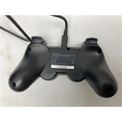 Sony PlayStation 3 60GB console with one PS3 controller, two PS2 controllers, BD remote control, PSP handheld gaming console with case, GAMEware PSP essentials pack, and a selection of PS2, PS3 and PSP games in original cases with instruction booklets 