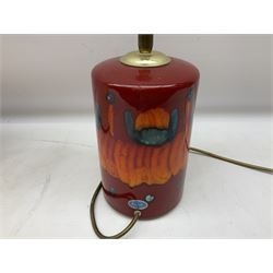Poole Pottery table lamp in Volcano pattern of cylindrical form, with a cream lampshade, lamp H30cm