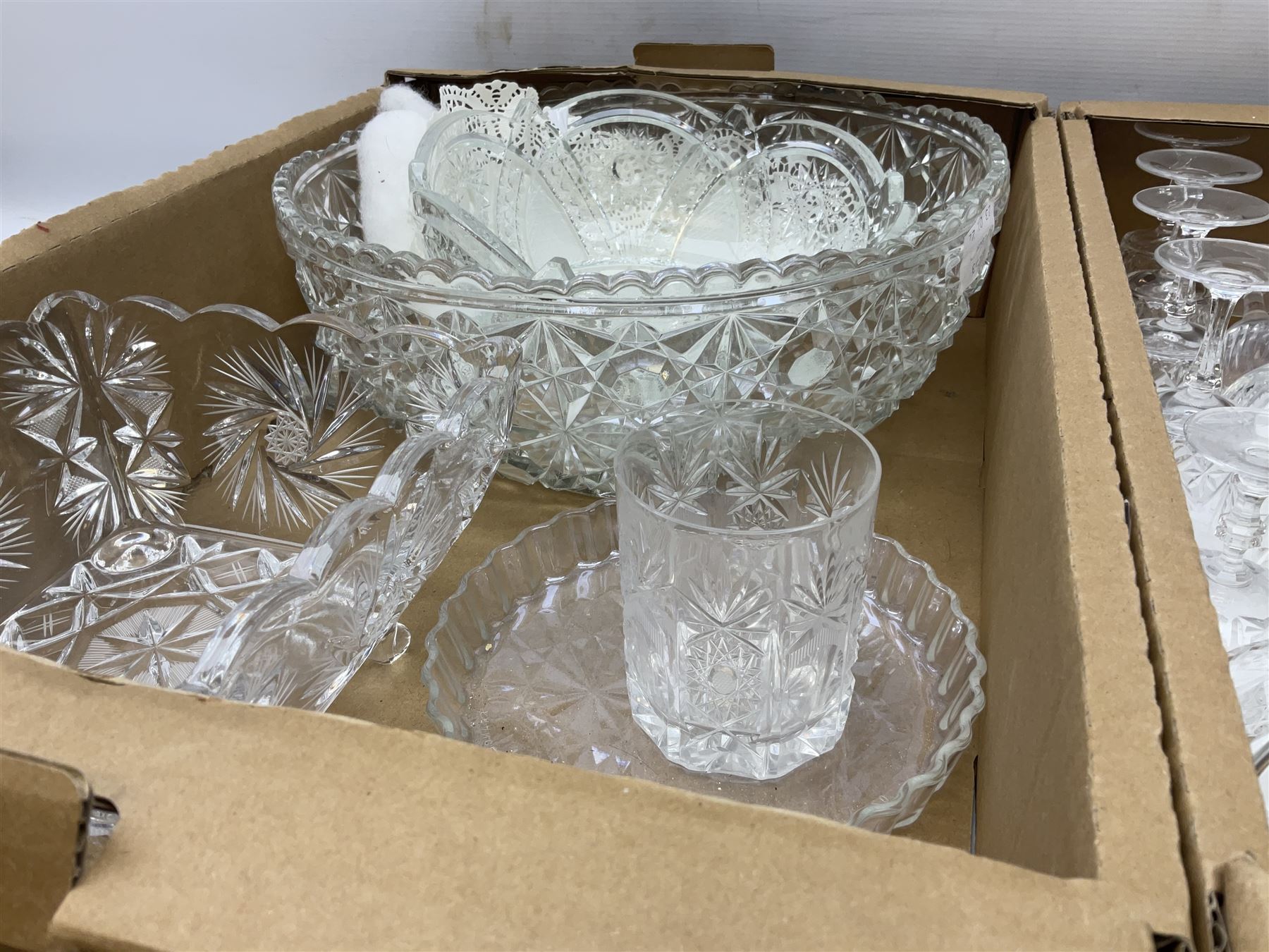 Seven boxes of glass to include sets of drinking glasses, decanters