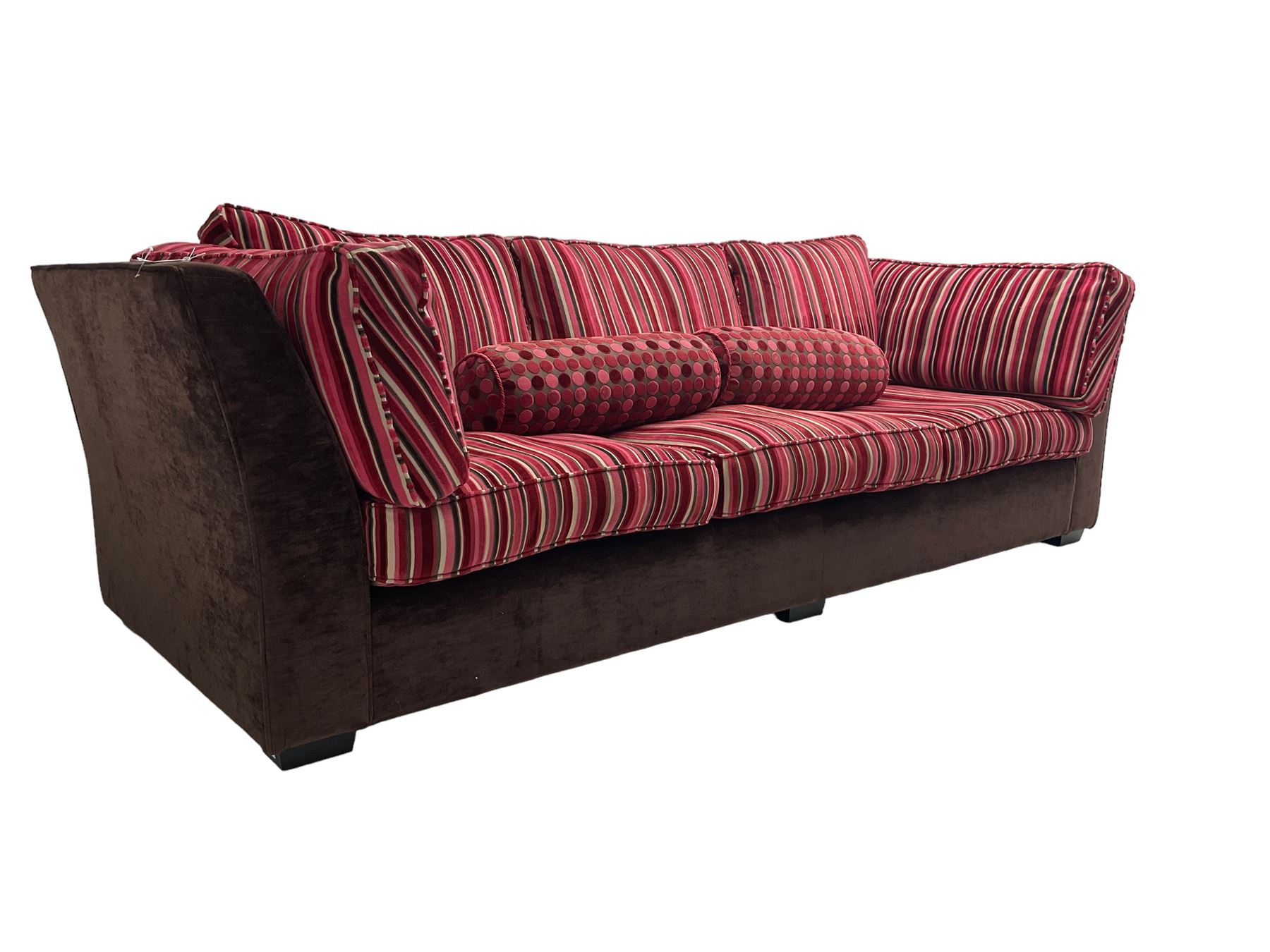 Collins & Hayes - grande three seat sofa upholstered in chocolate fabric, the loose cushions upholstered in textured fuschia stripes with contrasting spotted bolster cushions