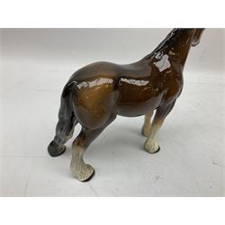 Seven Beswick figures of horses, including Connemara pony in grey no.1641, Arab in bay no.1265, large foal in grey no.947 etc, together with a Goebel figure of a horse (8)