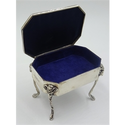  Edwardian silver dressing table jewellery box, the hinged lid embossed with Iris decoration, ram's heads leading to hoof feet by William Comyns & Sons, London 1904, H8cm. Provenance Property of Bob Heath, Brandesburton Formerly of Ravenfield Hall Farm near Rotherham  