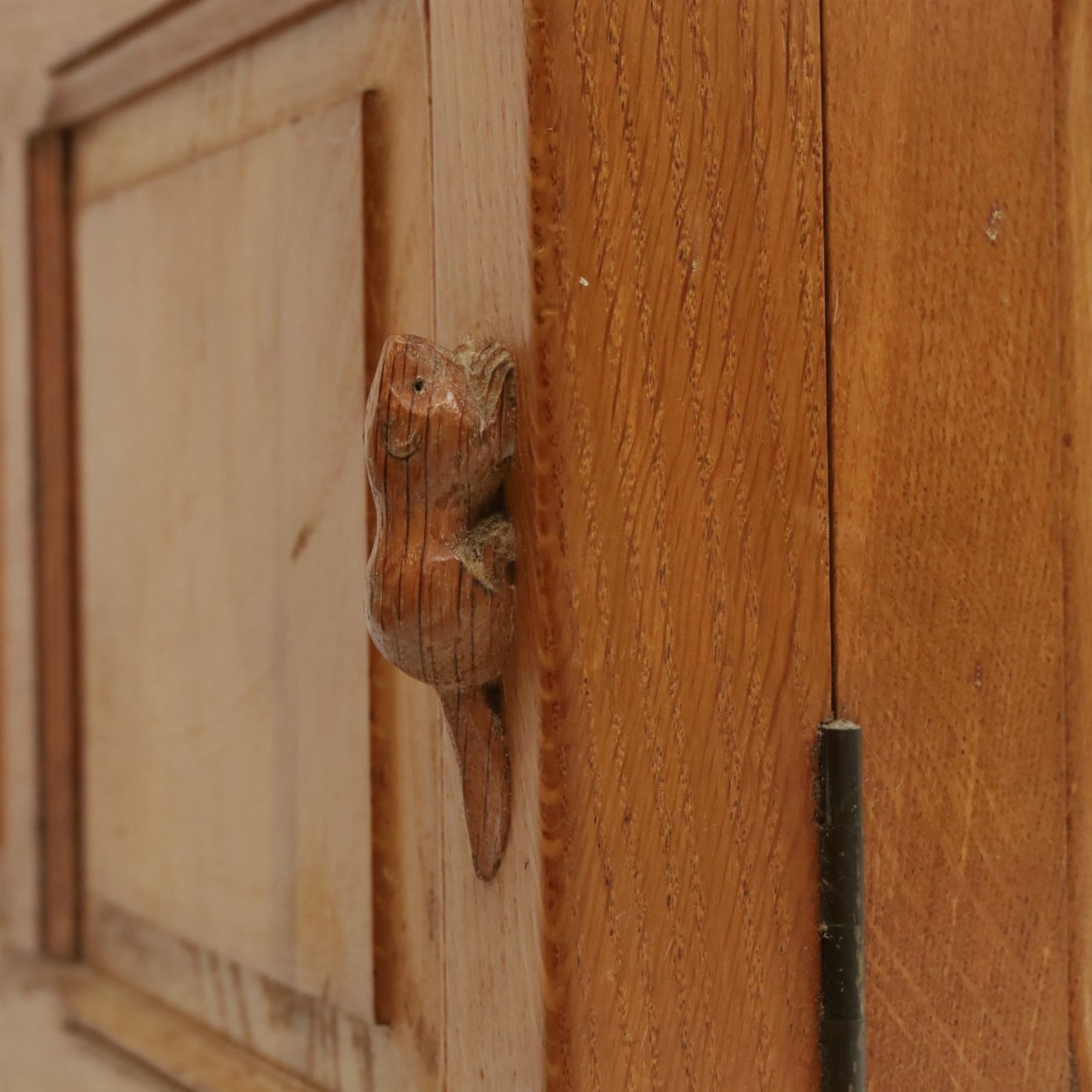Beaverman - oak double wardrobe, enclosed by twin multi-panelled doors, Yorkshire Rose carved handles, the interior fitted with shelf and hanging rail, with signature carved beaver, by Colin Almack of Sutton, near Thirsk