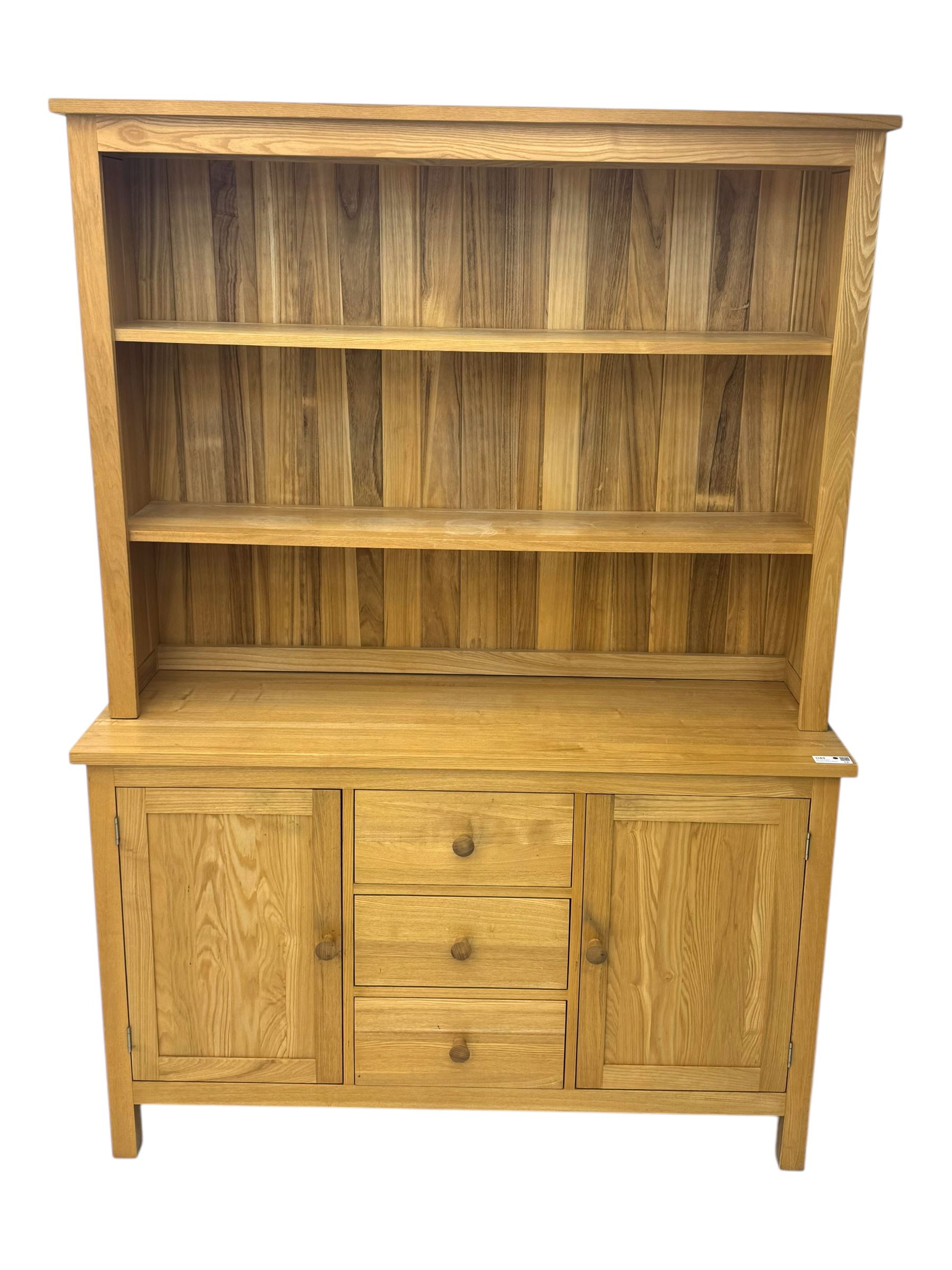 Oak kitchen dresser, raised two-tier back over three drawers and double cupboard
