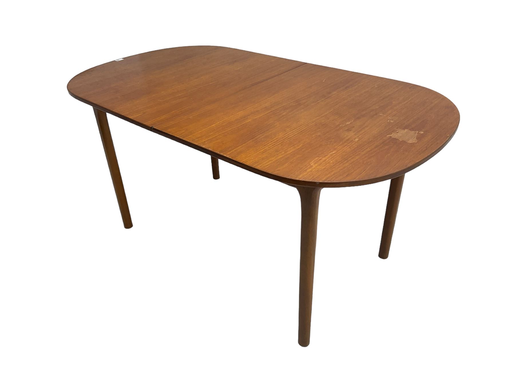 AH McIntosh & Co of Kirkaldy - mid-20th century teak extending dining table, rectangular top with rounded corners, concealed integrated double leaf, raised on tapered supports, 'Furniture by McIntosh sticker to underside of leaf