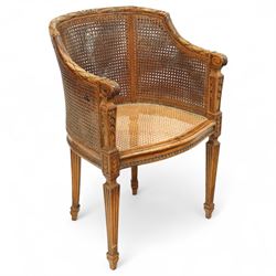 Louis XVI design bergère armchair, the shaped carved frame with scroll arm terminals and b...