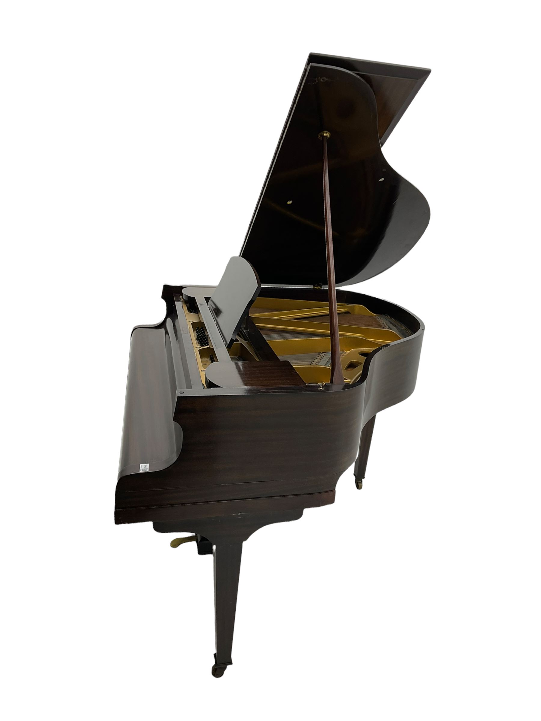 A mid 20th century English baby grand piano by Osbert, with an iron frame and overstrung stringing in a mahogany case,  conforming Lyre with sustain and una corda pedals and music desk, with original stringing, hammer action, dampers and felts, 7-1/4 octaves with 88 original ebony and ivory covered keys, with stool