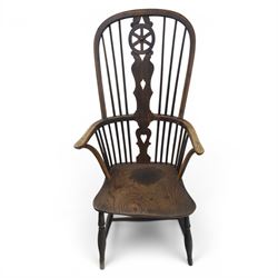 19th century Provincial wheelback Windsor armchair, high stick back, saddle seat on four turned legs with H-stretchers