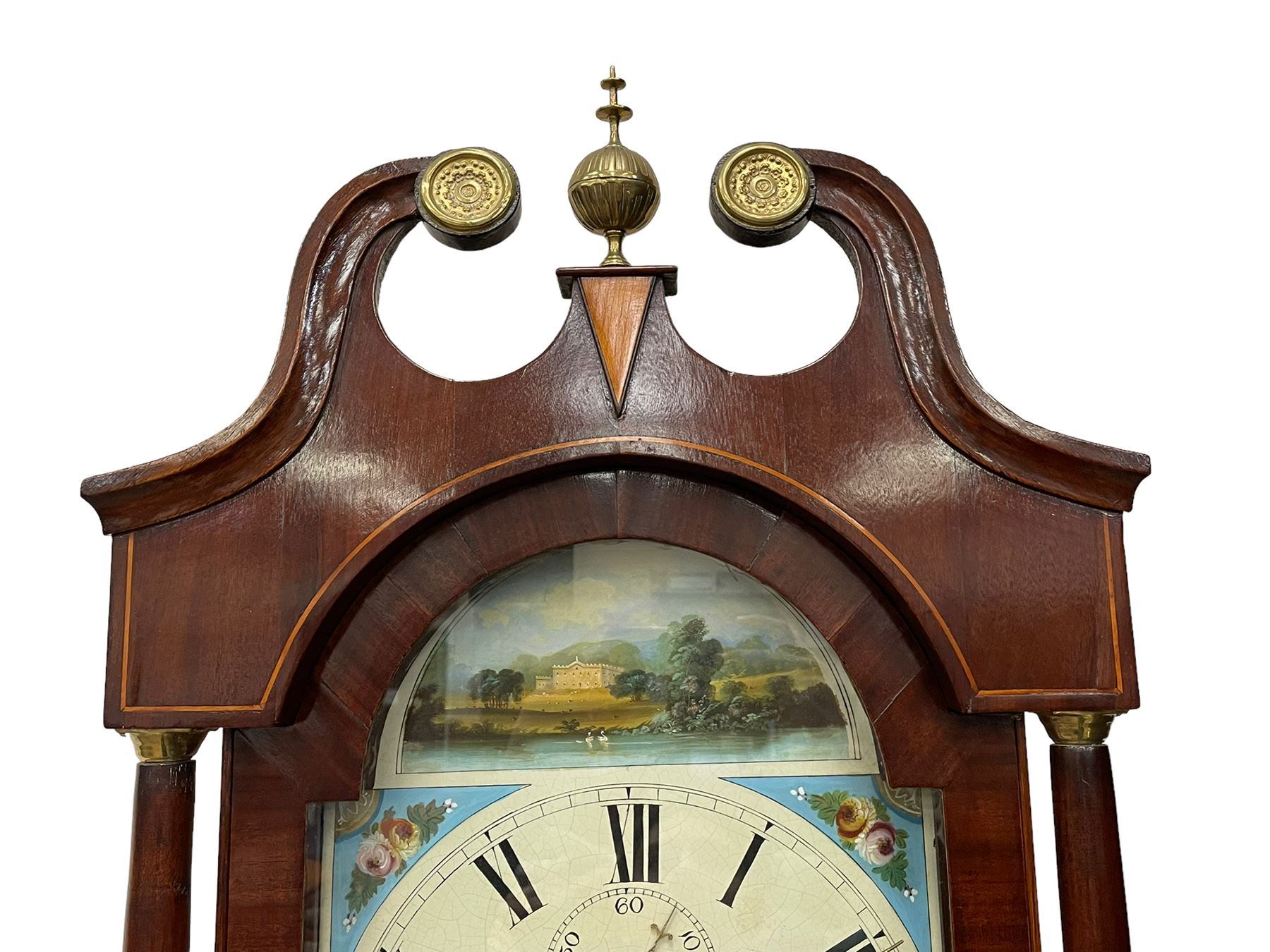 Musson of Louth - mid-19th century oak and mahogany 8-day longcase clock, with a swan’s neck pediment and ball and spire brass finial, break arch hood door flanked by reeded pilasters with brass capitals, canted angled trunk, flat topped door with concave corners, rectangular plinth on bracket feet, fully painted break arch dial with Roman numerals and minute track, subsidiary seconds dial and calendar aperture, matching stamped brass hands, eight day rack striking movement with anchor escapement. With weights and pendulum.
H206 W44 D23
Balthazar Musson from Baden (Germany) is recorded as working in Louth from 1835, naturalised 1861-8. Succeeded by his son, George Balthazar 1872-1920. 
