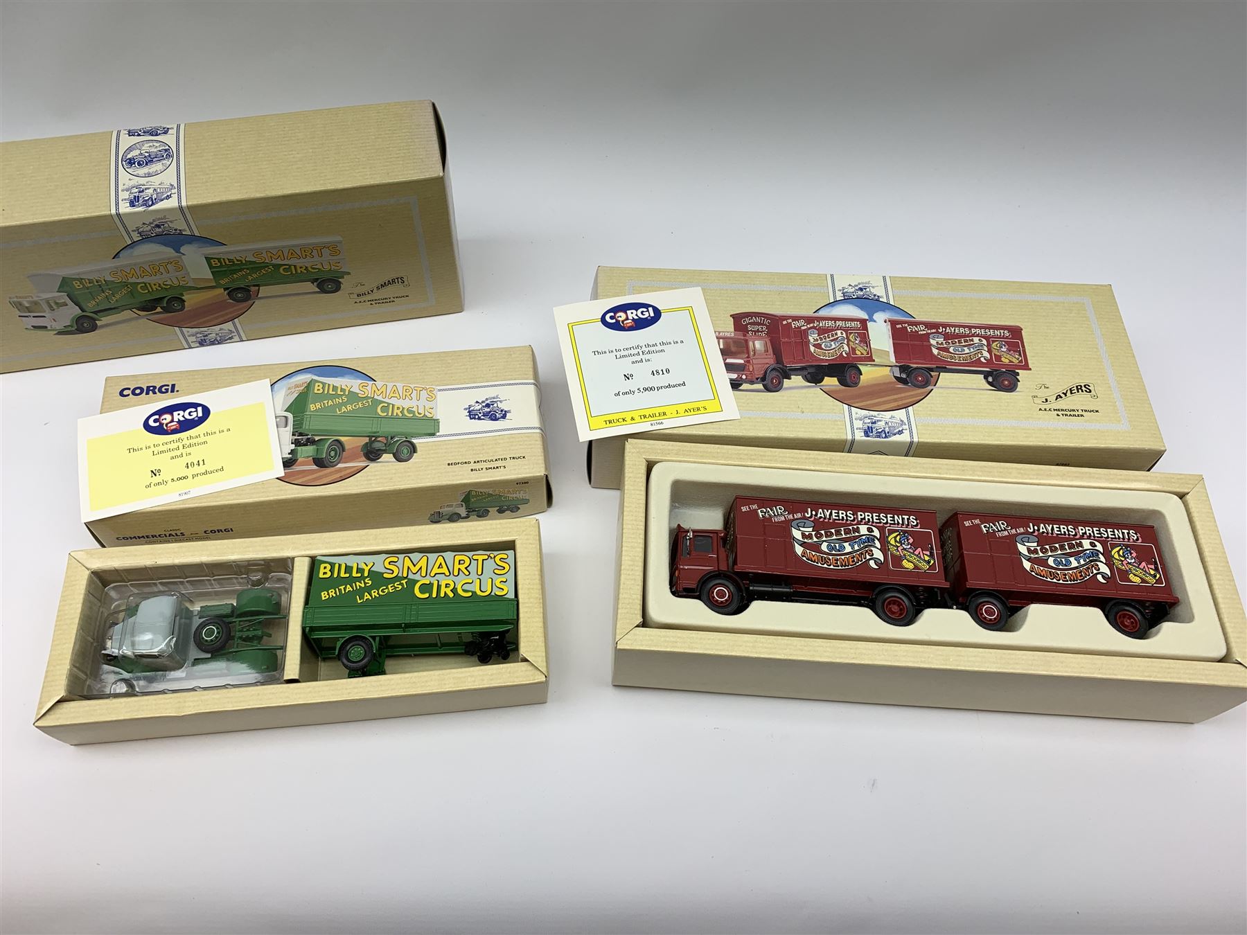 Four Corgi limited edition Billy Smart's Circus vehicles - 97300 Bedford Articulated Truck; 97891 AEC Mercury Truck & Trailer; 97897 Scammell Highwayman & Trailers; and CC02001 Premium Edition Mini Van; together with 97893 AEC Mercury Truck & Trailer for J. Ayers and 97889 AEC Cage Truck & Trailer for Chipperfields, all mint and boxed with certificate (6)