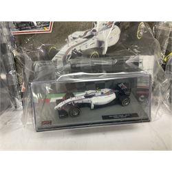 Panini Formula 1 The Car Collection - twelve die-cast models including ten in unopened packaging with periodical; all models in plastic display boxes; and eight other boxed die-cast models of racing cars by Corgi, Onyx, Classico, Minichamps etc (20)
