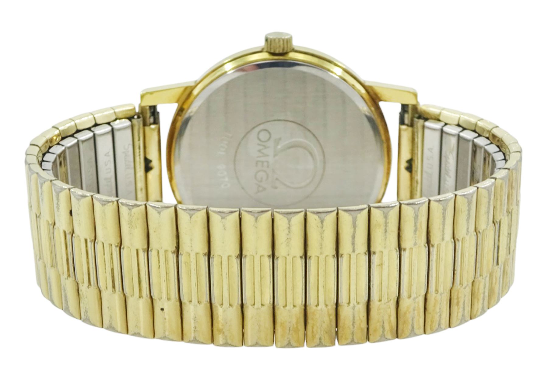 Omega gentleman's gold-plated and stainless steel manual wind wristwatch, Ref. 136.0104, Cal. 1030, silvered dial with baton hour markers and date aperture, on expanding gilt strap, boxed