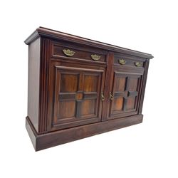 Victorian mirror back press, the arched corniced mirror back flanked by half columns, the base fitted with three drawers and four moulded panel doors with geometric detail, on a block plinth