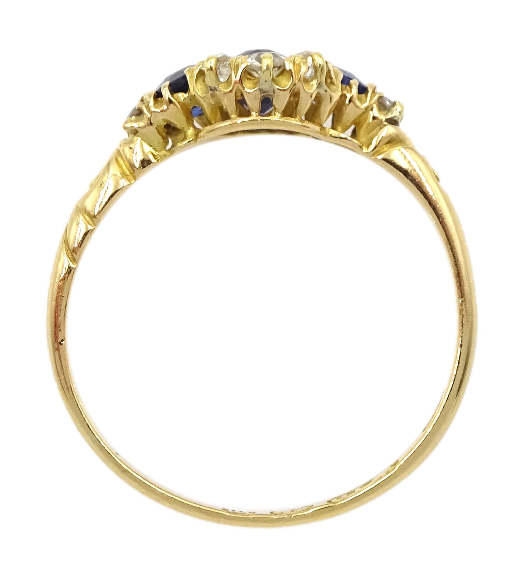 Victorian 18ct gold sapphire and diamond cluster ring, with engraved scroll design shoulders, Birmingham 1896