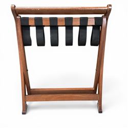 Ten walnut finish folding luggage stands