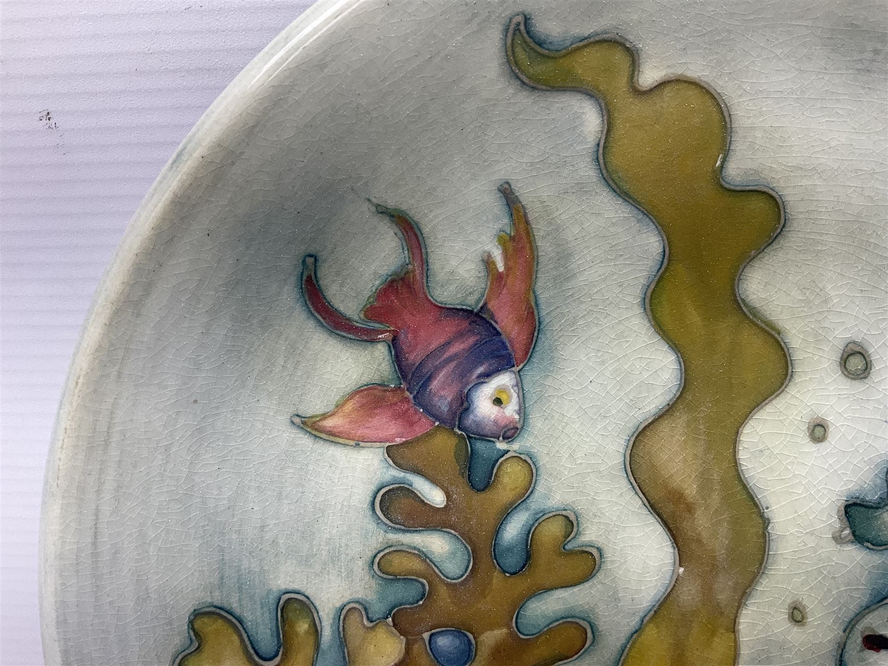 Moorcroft charger decorated in Seahorse pattern, circa 1960, with painted and impressed marks beneath, D26cm