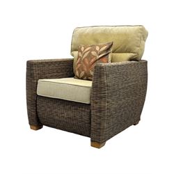 Contemporary two seat rattan conservatory sofa with loose cushions, and pair of matching armchairs, with upholstered seat and back cushions in a beige fabric, curved arms and front complete with scatter cushions 

Chairs (H 92cm, W 75cm, D 84cm)
Sofa (H 92cm, W 130cm, D 84cm)