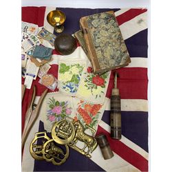 Two leather bound books, items of treen, horse brasses, quantity of stamps, fan entitled ‘All my Best Love’ with Rememberance poem, flag and other misc etc in two boxes