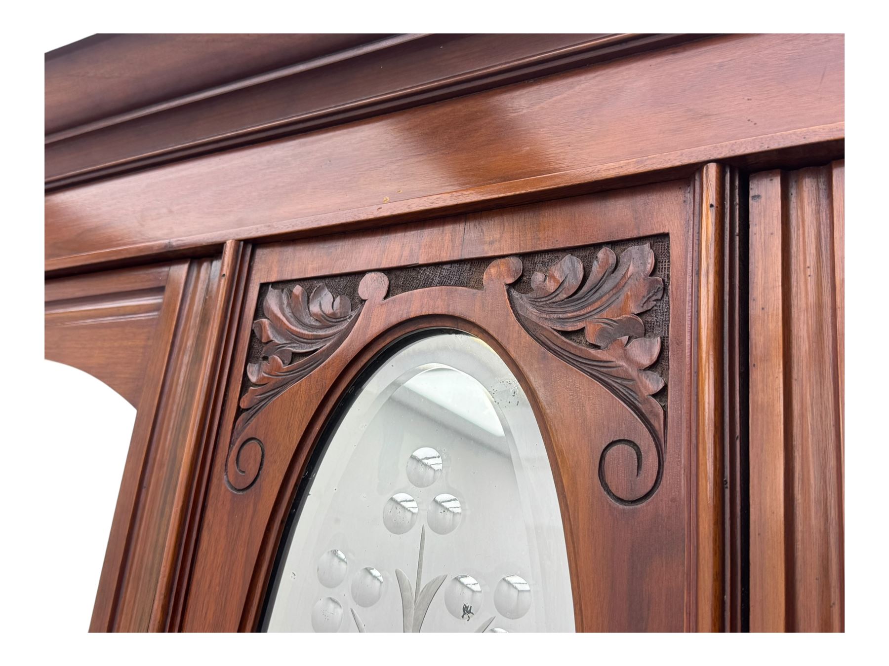 Victorian walnut dresser, projecting cornice over mirrored front, fitted with two short over two long drawers, on turned feet
