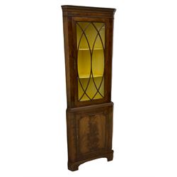Quality mid 20th century figured mahogany corner cupboard, floor standing by Hunter and Smallpage of York