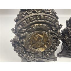 Two early 20th century cast-iron money banks - 'Our Kitchener Bank' c1914 H17cm and 'Our Empire Bank' c1911 depicting George V and Queen Mary H17cm; both by Sydenham & McCoustra; and another similar for The Prince & Princess of Wales 1981 by Robert Brown (3)