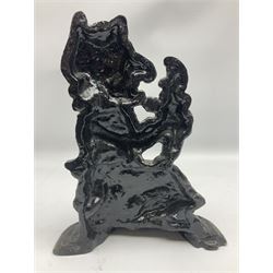 Cast iron moulded doorstop in the form of Punch and Judy, H29cm