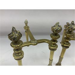 Early 20th century brass coal bucket with pierced sides, upon three pad feet, together with a pair of brass fire dogs, with flambe finials, coal bucket H27cm