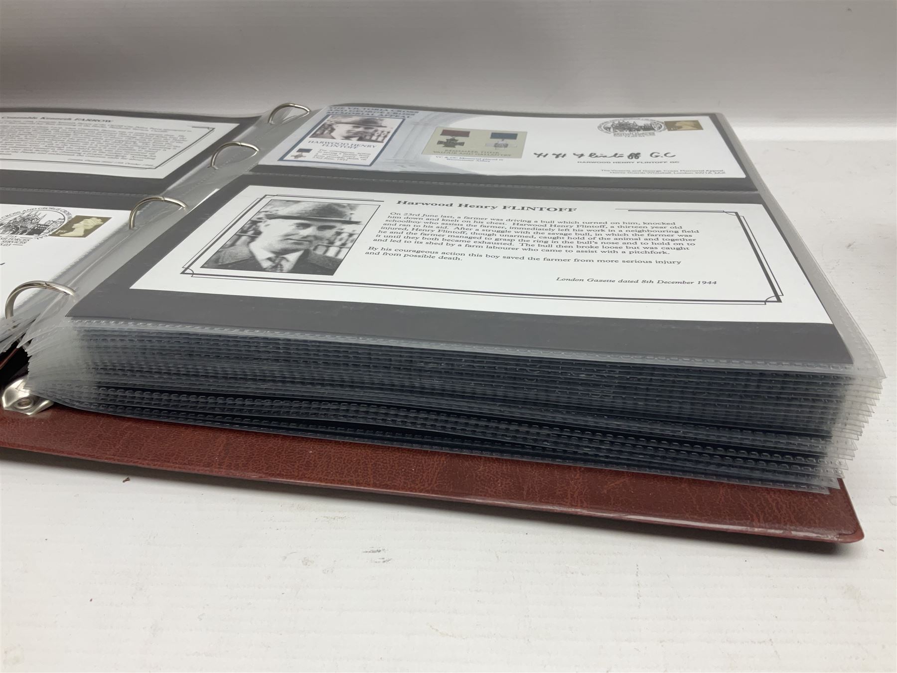 Album containing over seventy Victoria Cross and George Cross related First Day Covers, Medal Covers, Coin Covers, PHQ cards and postcards, Presentation Packs etc; some bearing signatures of the recipient.