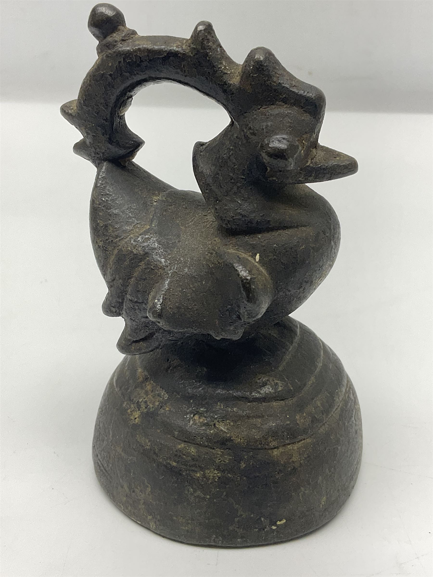 19th century graduating set of Burmese bronze opium weights, in the form of Hintha birds, tallest H11.5cm (8)