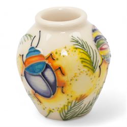 Seven Moorcroft miniature vases, various patterns including snowdrops, beetles, insects, cat fish etc, H6cm max (7)
