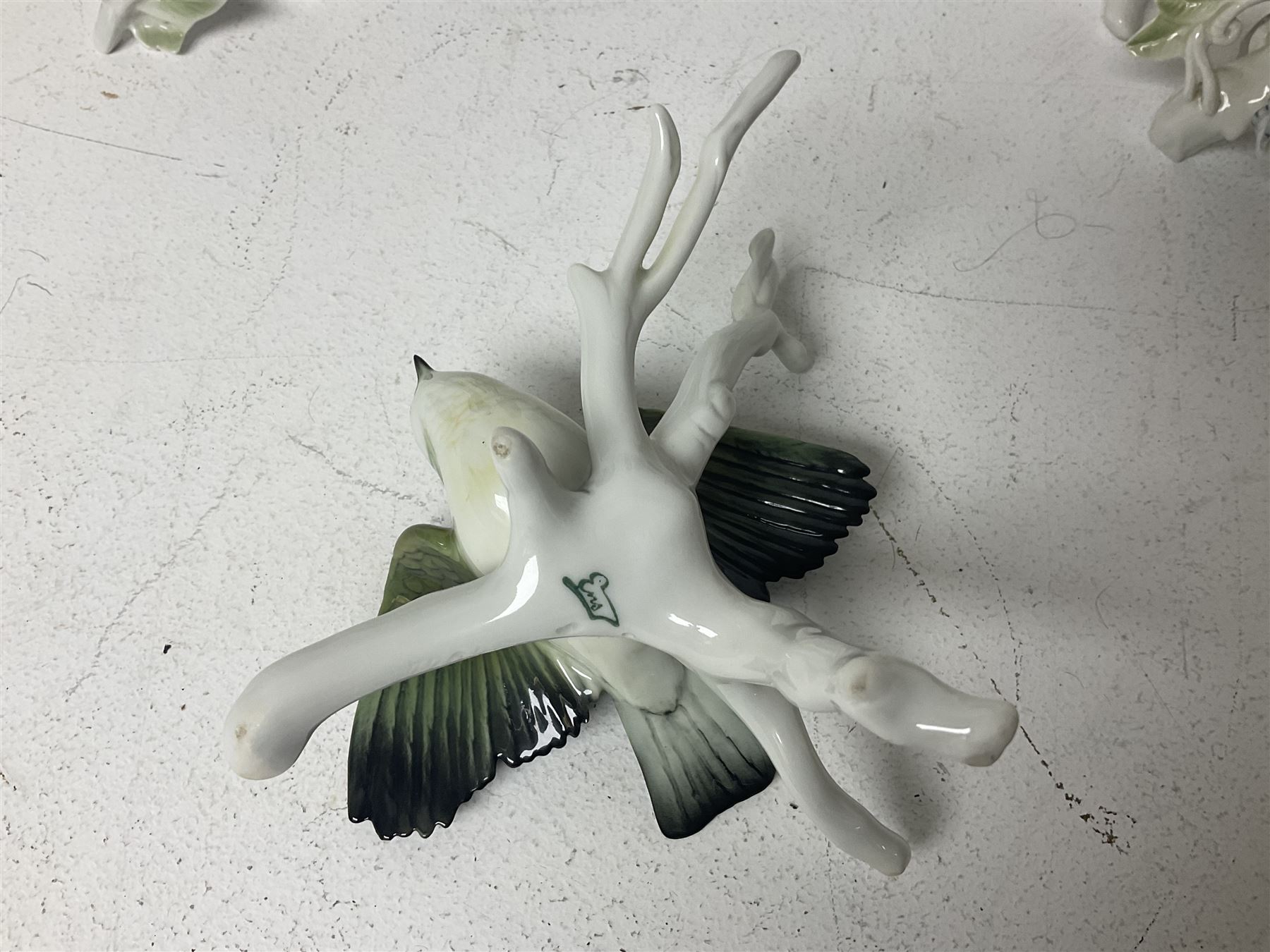 Seven Karl Ens bird figures, including barn owl, eagle owl, blue tit, budgerigar etc, all with mark beneath, tallest H17cm 