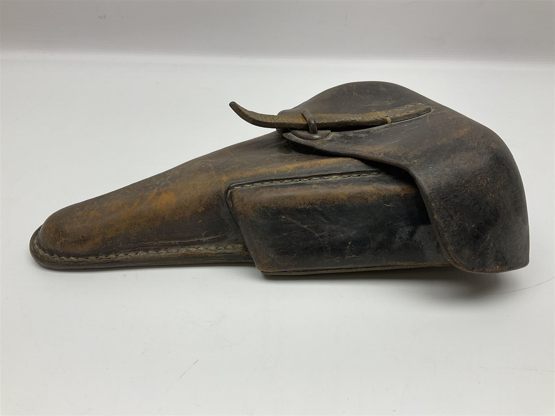 WWII German brown leather holster with side magazine pouch for a Walther P.38 semi-automatic pistol, stamped P38 and OWX 1941 on back L24.5cm
