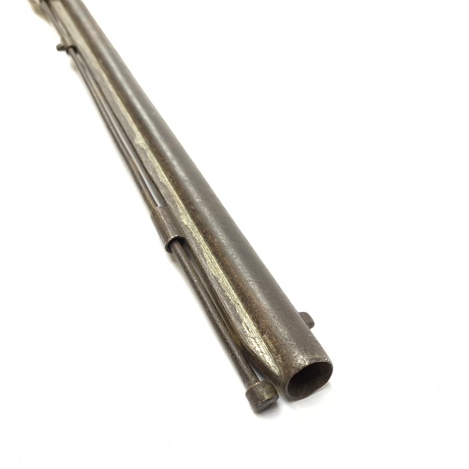 Indian ornamental percussion cap muzzle loading musket with walnut stock, chequered pistol grip, brass fittings and under barrel ramrod L112cm overall