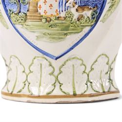 18th century South Yorkshire prattware jug, moulded in relief a band of stylised leaves,  with  'Mischievous Sport' and 'Sportive Innocence' pattern to the centre, H19cm