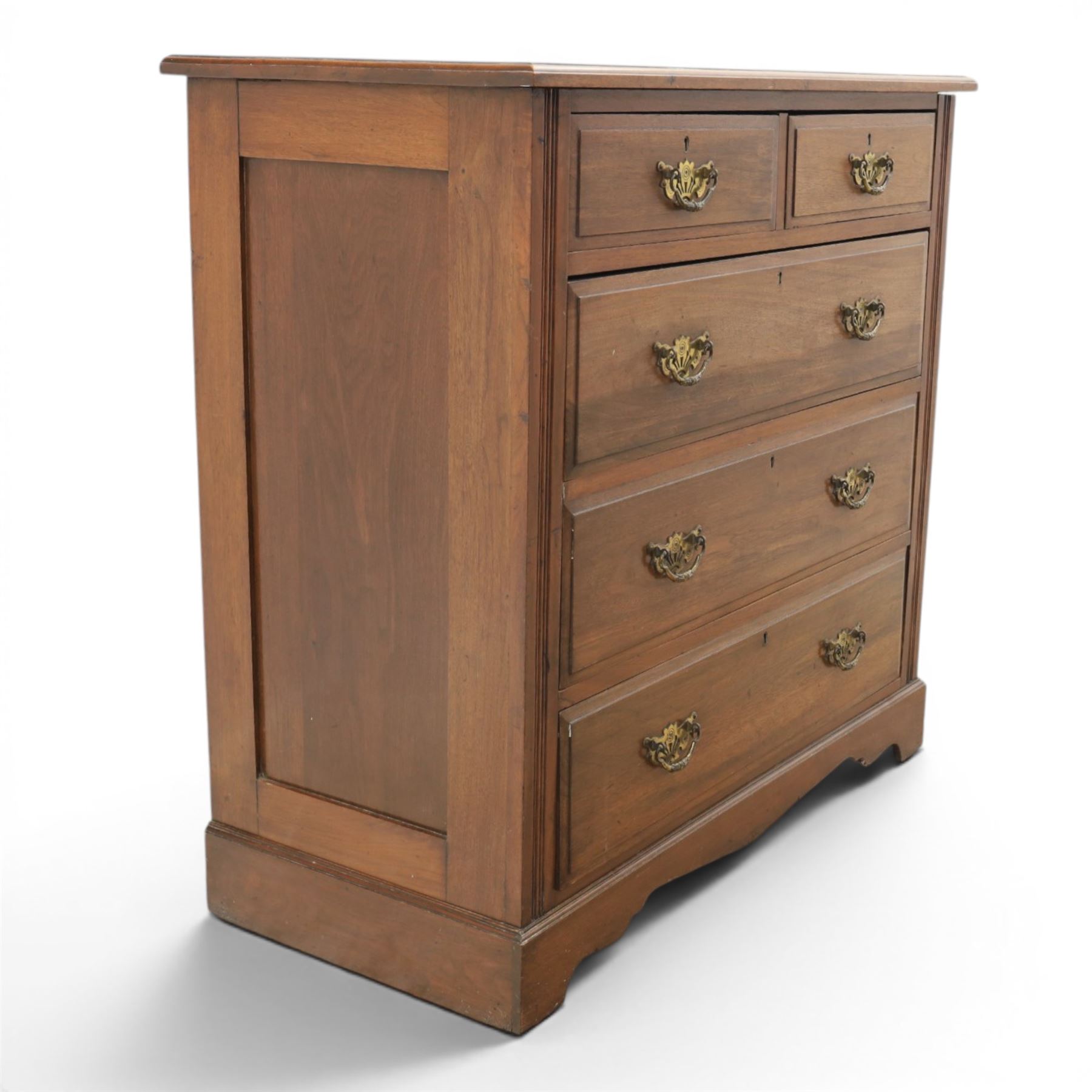 19th century mahogany chest, two short over three long drawers with pierced brass handles, raised on bracket feet 