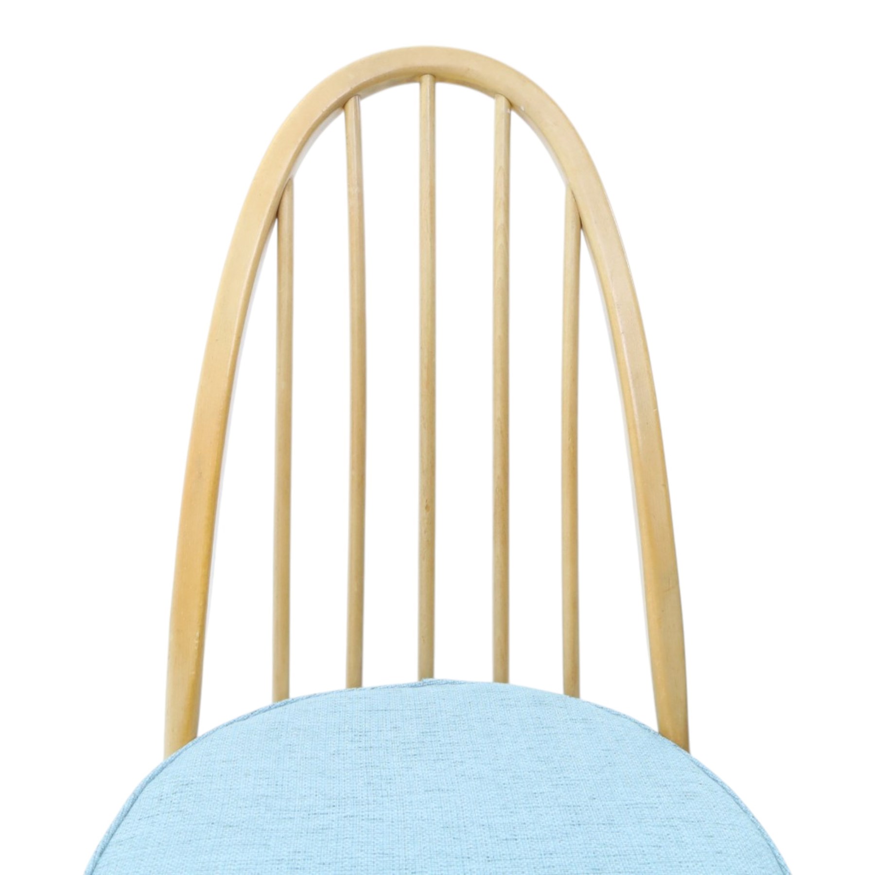 Ercol - set of four 'Quaker' dining chairs, with high hooped back, blue seat cushions with studded, tapered supports  