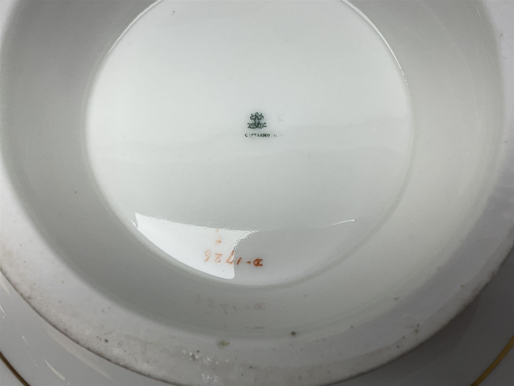 Victorian Copeland, Botanical dessert service, decorated with floral sprigs to the centre with a pink and gilt border, comprising five comports and seven plates, largest comport H20cm, plate D22cm