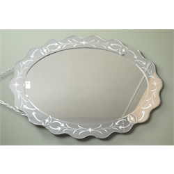  Rectangular moulded framed bevel edge mirror, (W85cm, H60cm) and an oval mirror with shaped edges  