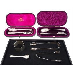 Victorian silver christening fork and spoon, Queens pattern by Charles Boyton (II), London 1895,  one other set with bright cut decoration, London 1892, two pairs of silver sugar nips, silver teaspoon and a silver napkin ring, all hallmarked, approx 8oz
