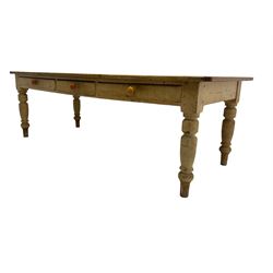 Victorian rustic rectangular pine kitchen table, fitted with three drawers, raised on ring turned supports