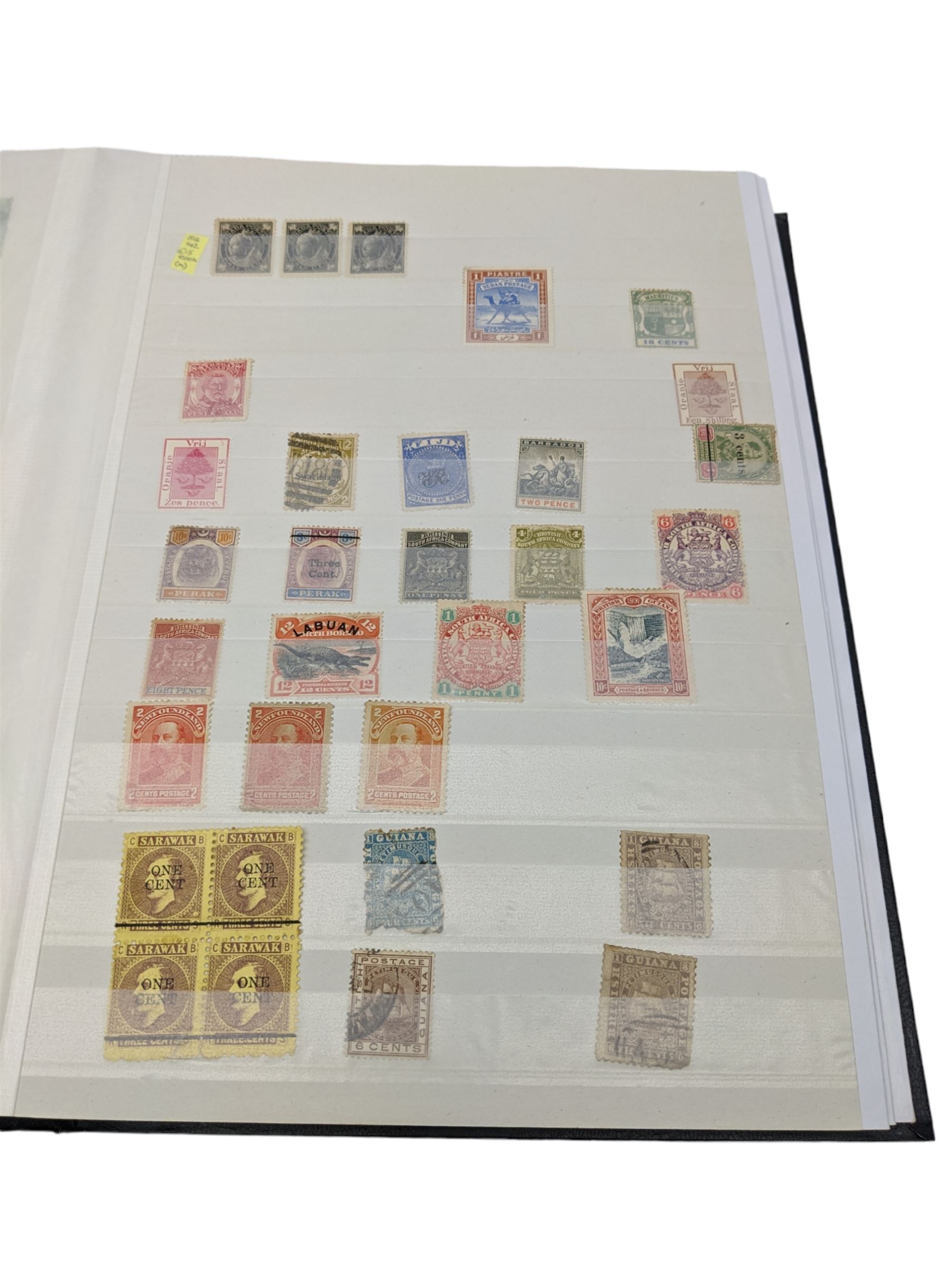 World Stamps including Seychelles, Southern Rhodesia, Sudan, Cyprus, Bermuda, Queen Victoria Canada, King Edward VII Straits Settlements etc, mixture of mint and used values, housed in a black stockbook