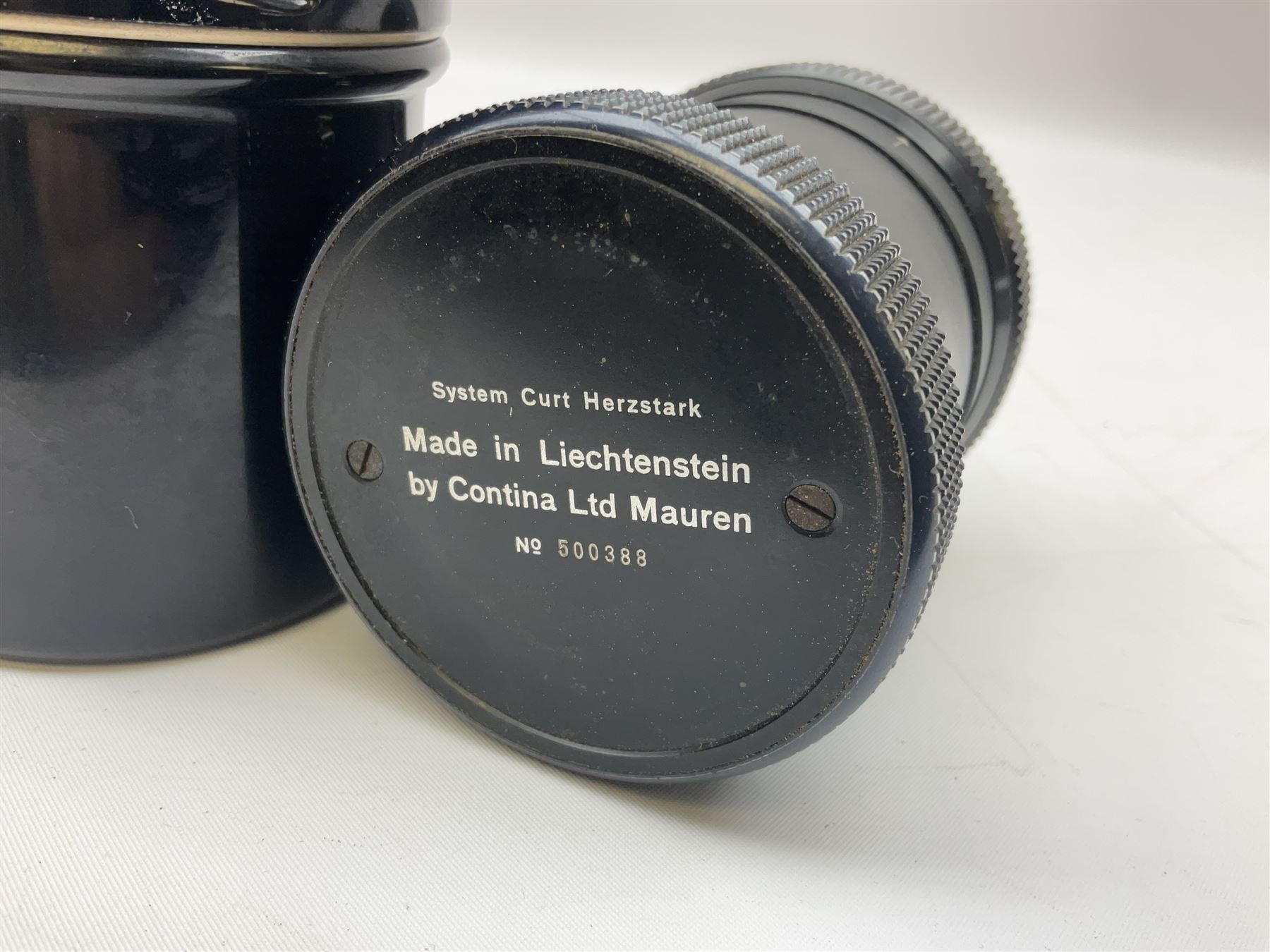Curta Type II mechanical calculator by Contina Ltd Mauren, Liechtenstein, serial no. 500388 c1953 in original domed black metal case, H13cm 