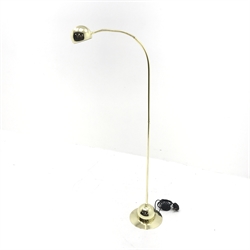 Brass floor standing reading lamp with adjustable head