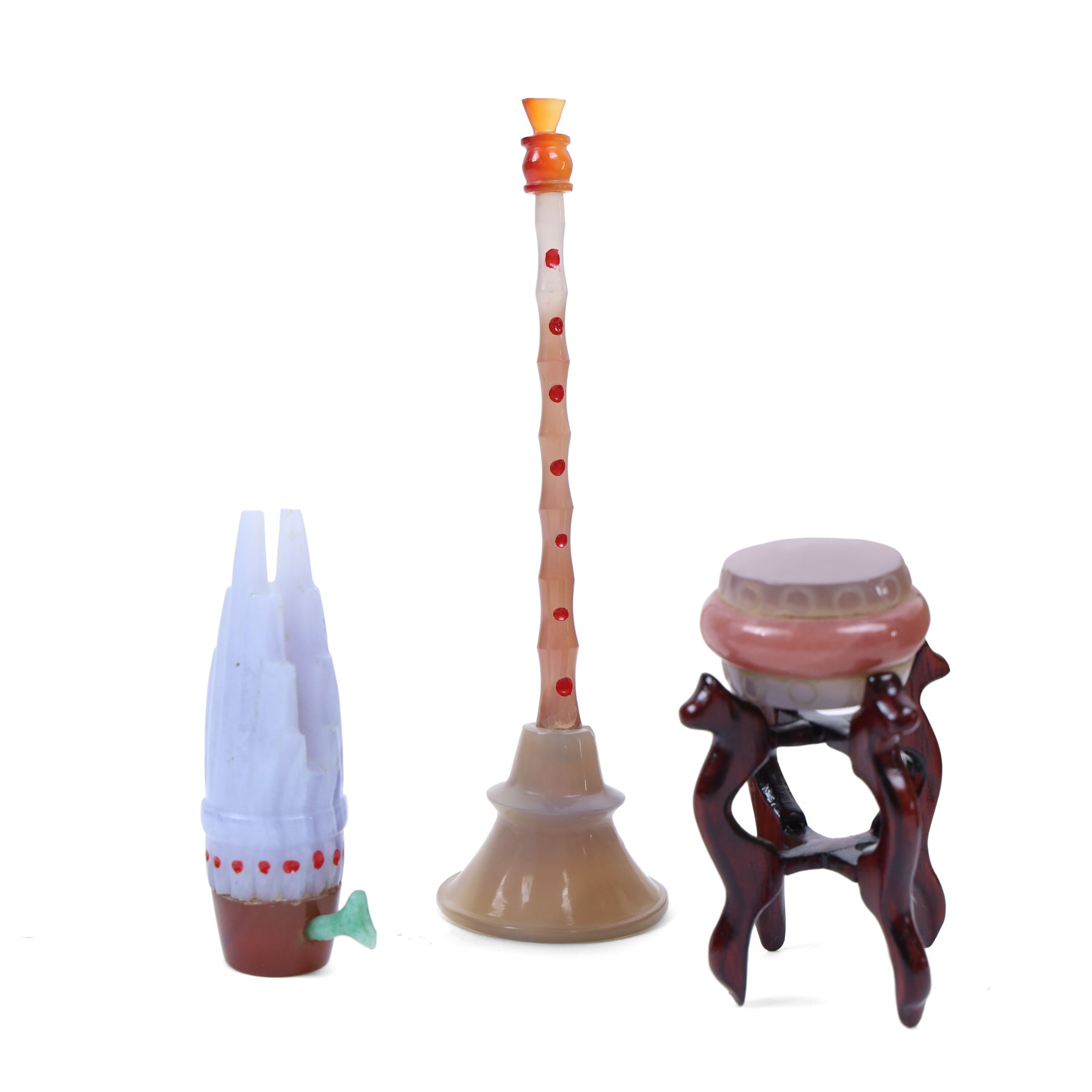 Boxed set of Chinese miniature polished hardstone musical instruments with hardwood stands