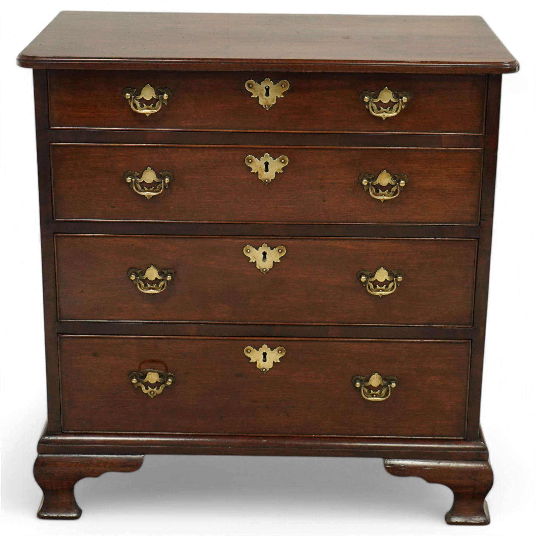 Small Georgian mahogany chest of drawers with four long graduated drawers with swan neck handles on ogee feet